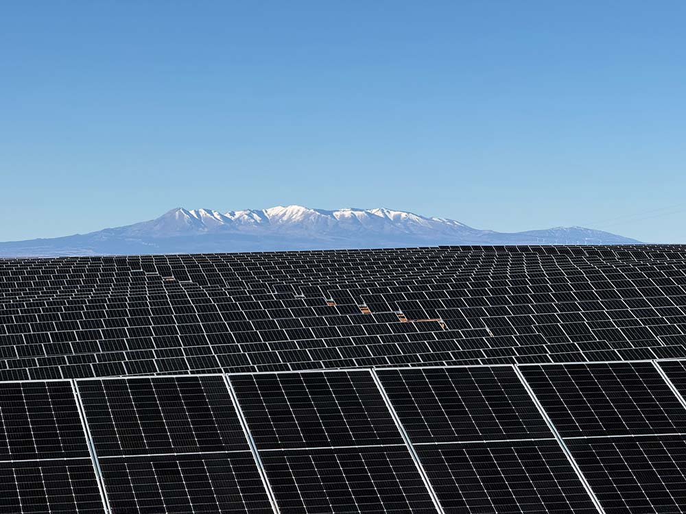Dolores canyon solar panel field in front of mountains